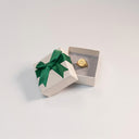 Papier-Ringbox mit Grüner Schleife