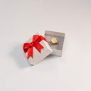 Papier-Ringbox mit Roter Schleife